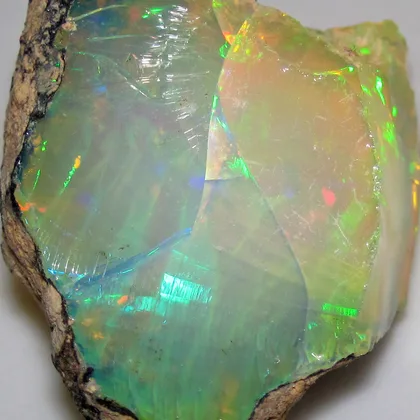 A hydrophane precious opal from Ethiopia, photographed dry